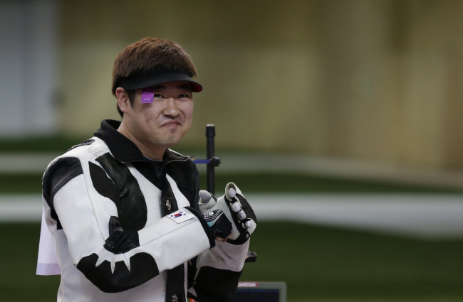 Gymnast wins dreamy gold; rifle shooter comes from behind for silver