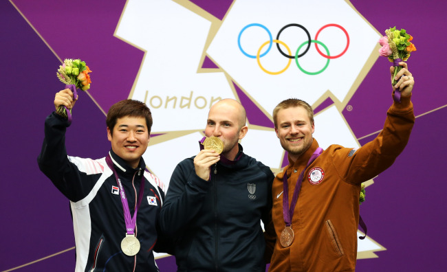 Gymnast wins dreamy gold; rifle shooter comes from behind for silver