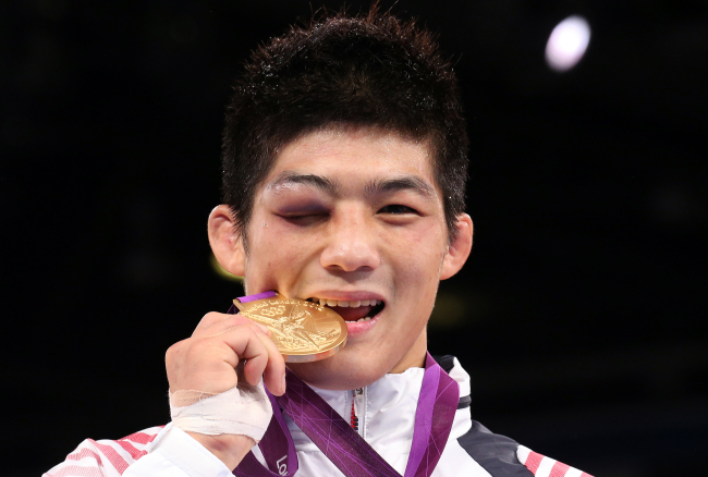 Korea wins 12th gold as men's football team fizzles