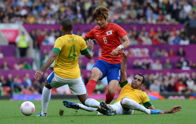 Korea wins 12th gold as men's football team fizzles