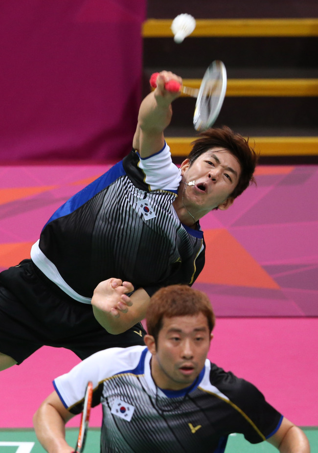 Korea’s Lee Yong-dae (top) and Chung Jae-sung   London Olympic Joint Press Corps