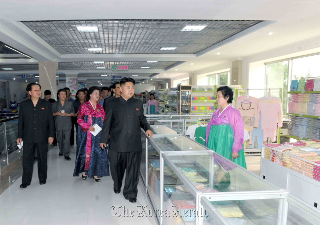 North Korean leader Kim Jong-un visits a department store in Pyongyang.  Yonhap News