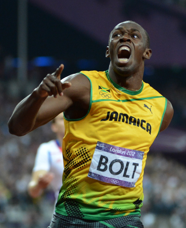 Usain Bolt celebrates his 200-meter gold medal.  UPI-Yonhap News