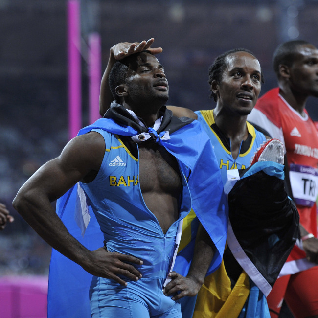 Chris Brown of the Bahamas (left) and teammate Ramon Miller celebrate after winning the Gold Medal in the Men's 4 X 400M Rely Final at the London 2012 Summer Olympics on Friday in Stratford, London. (UPI-Yonhap News)