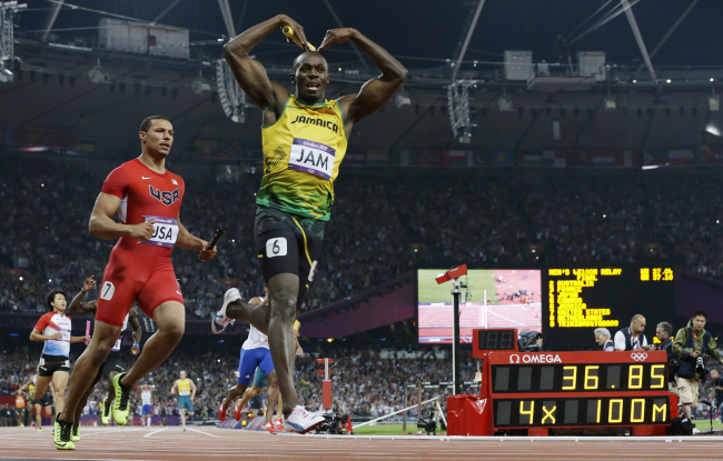 Jamaica’s Usain Bolt celebrates his win in the men’s 4x100-meter relay final on Saturday.  AP-Yonhap News