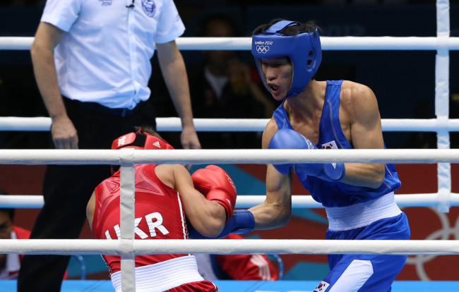 Han Soon-chul wins silver in men's lightweight boxing