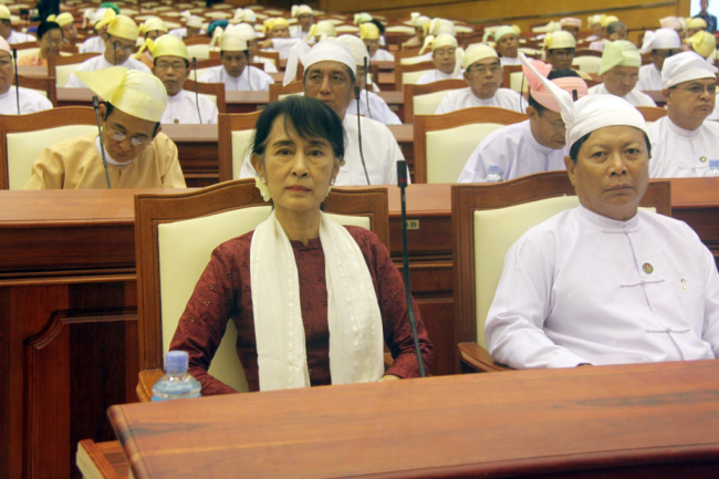 Myanmar Opposition leader Aung San Suu Kyi attends a regular session of parliament at Myanmar Lower House, in Naypyitaw, Wednesday.   AP-Yonhap News