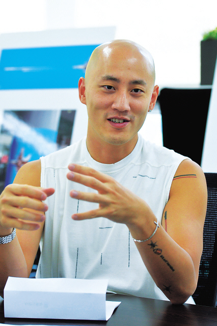 Designer adds new touch to Herald corporate identity