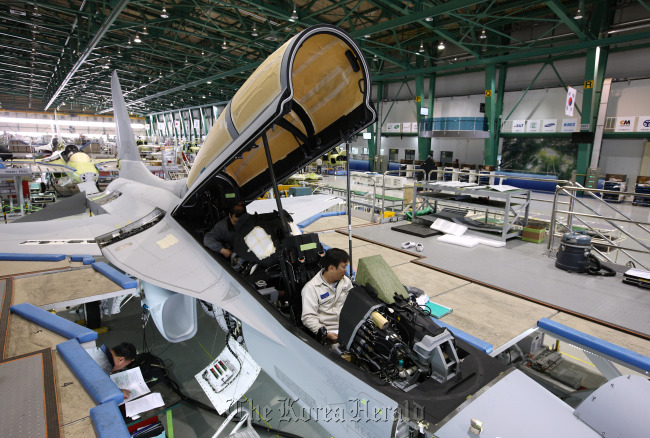 Employees work on a TA-50 trainer jet on the production line of the Korea Aerospace Industries Ltd. plant in Sacheon, South Gyeongsang Province.   Bloomberg
