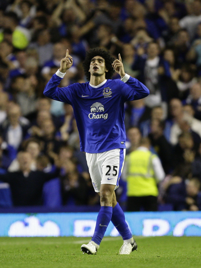 Everton’s Marouane Fellaini celebrates his goal against Manchester United.   AP-Yonhap News