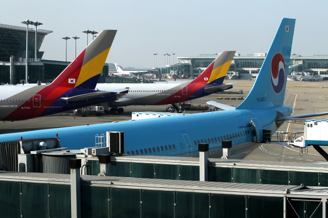 Aircraft wait on the tarmac at Incheon International Airport. (Bloomberg)