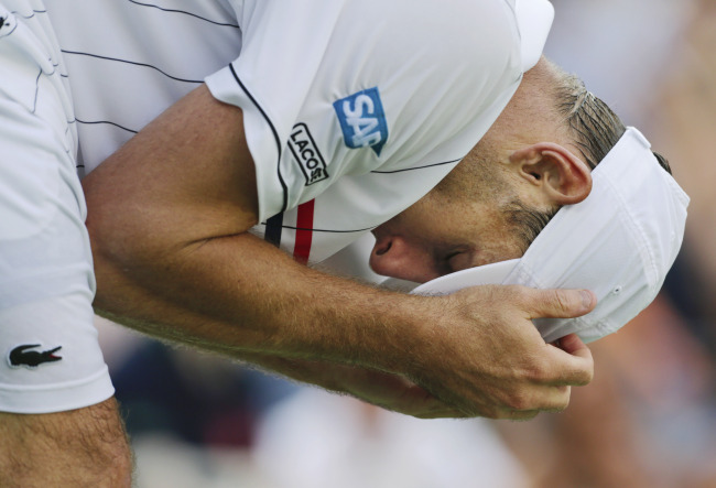 Andy Roddick reacts during his match with Argentina’s Juan Martin Del Potro in the quarterfinals of the 2012 U.S. Open tennis tournament in New York on Wednesday.   AP-Yonhap News