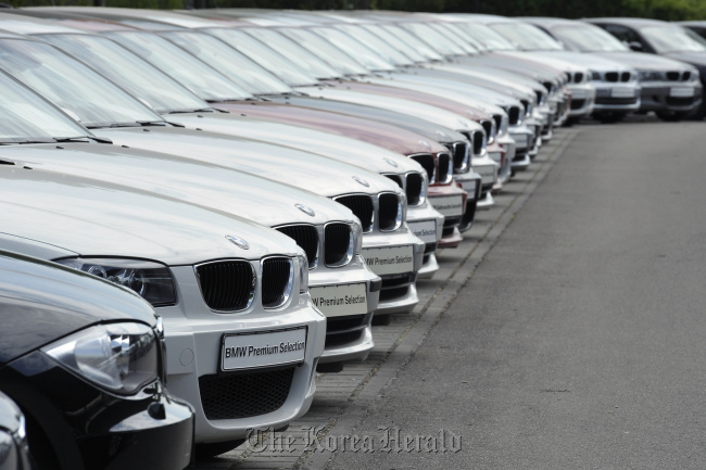 BMW Premium Selection vehicles sit on a dealership.   Bloomberg