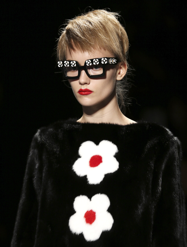 A model wears a creation part of the Prada Women’s Spring-Summer 2013 fashion collection, during the fashion week in Milan, Italy, on Sept. 20, 2012.   AP-Yonhap News