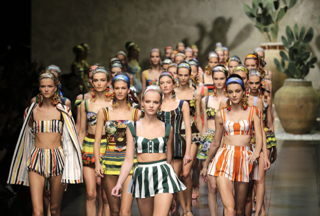 Models wear creations from the Dolce & Gabbana women’s Spring-Summer 2013 fashion collection, during the fashion week in Milan, Italy, on Sunday.   AP-Yonhap News