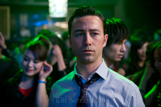 Joseph Gordon-Levitt as “Joe” in TriStar Pictures, Film District, and End Game Entertainment’s action thriller “Looper.”   Courtesy of Alan Markfield/MCT