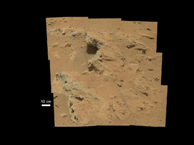 This image provided by NASA shows shows a Martian rock outcrop near the landing site of the rover Curiosity thought to be the site of an ancient streambed.   AP-Yonhap News