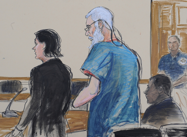 In this courtroom drawing, defense attorneys Sabrina Shroff and Jerrod Thompson Hicks represent accused
terrorist Abu Hamza al-Masri (center) before Magistrate Judge Franklin Maas in Manhattan federal court in New York on Saturday.    AP-Yonhap News