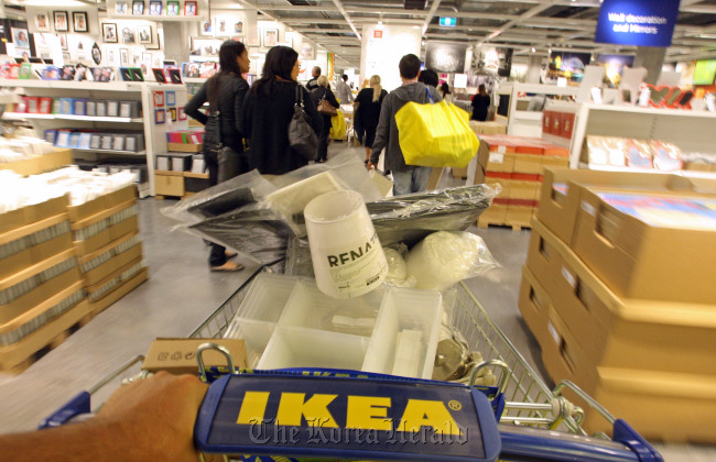 A shopping trolley is wheeled through IKEA Group’s store in Sydney.   Bloomberg