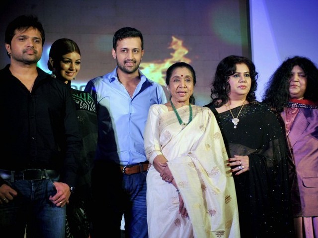 From left to right: Indian singer and performer Himesh Reshmmiya, Indian actress Ayesha Takia, Pakistani pop singer Atif Aslam, Indian playback singer Asha Bhosle, Bangladeshi Singer Runa Laila and Pakistani Sufi Singer Abida Parveen pose during a media event for the television musical show "Sur-Kshetra". (AFP)