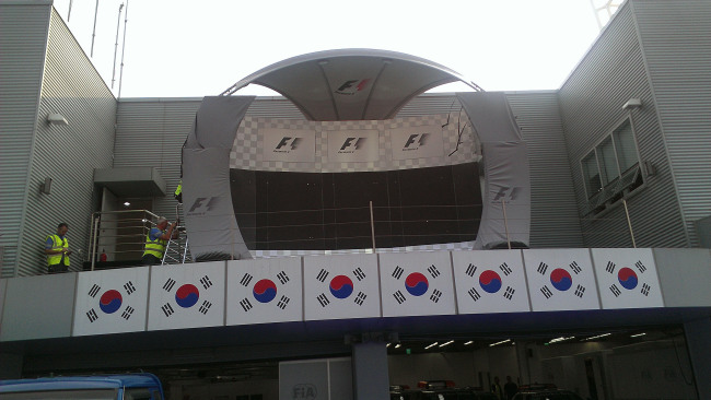 Officials for the Korean Grand Prix check the podium at the Korea International Circuit in Yeongam.   Yonhap News