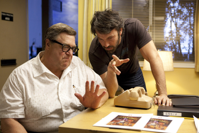 John Goodman and director Ben Affleck are seen on the set of “Argo.” (Claire Folger/MCT)