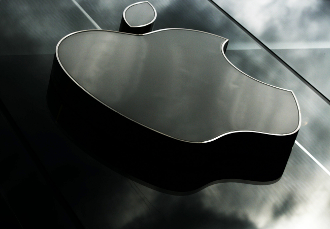 This file photo shows the company logo at the Apple Store in London.(AP)