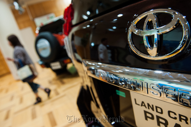 Toyota Motor Corp. vehicles are displayed at the company’s showroom in Tokyo.   Bloomberg
