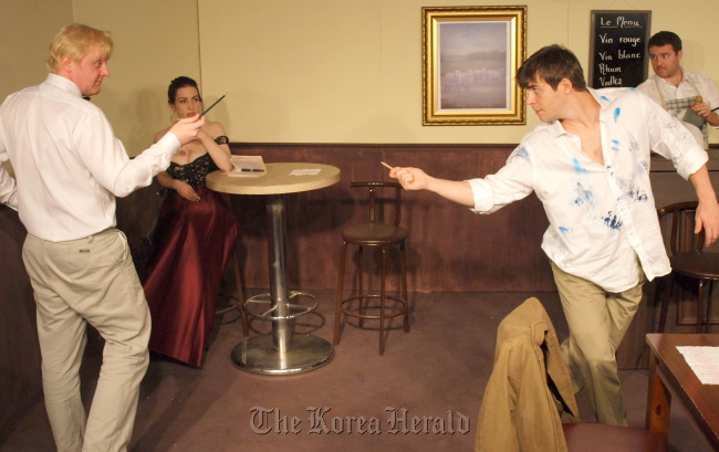 Robbie Quinn (left) as Einstein and Daniel Kennedy as Picasso in White Box Theater’s production of “Picasso at the Lapin Agile.”   White Box Theater