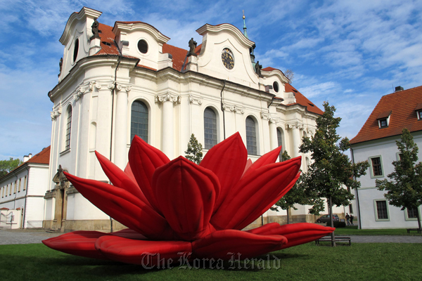 “Breathing Flower/Red Lotus” by Choi Jeong-hwa at Brevnov Monastery in Prague.   JW Stella Arts Collectives