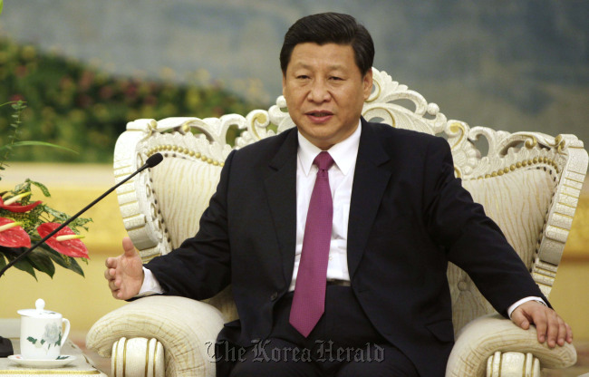 Chinese Vice President Xi Jinping speaks at a meeting with Egypt's President Mohammed Morsi at the Great Hall of the People in Beijing on Aug. 29. (AP-Yonhap News)