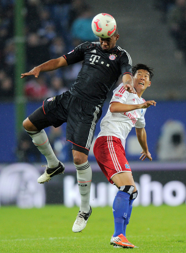 <YONHAP PHOTO-0274> HAMBURG, GERMANY, NOV 3: Heung Min Son and Jerome Boateng (Bayern) during the Bundeliga league match between Hamburg SV and FC Bayern Muenchen in Hamburg, Germany on November 3, 2012. (EDITORIAL USE ONLY IN SOUTH KOREA).Photographer: WITTERS/PENTA PRESS/2012-11-04 06:46:57/ <저작권자 ⓒ 1980-2012 ㈜연합뉴스. 무단 전재 재배포 금지.>
Hamburg’s Son Heung-min (right) and Bayern’s Jerome Boateng vie for the ball on Saturday.   Penta-Yonhap News
Hamburg’s Son Heung-min (right) and Bayern’s Jerome Boateng vie for the ball on Saturday.   Penta-Yonhap News
Hamburg’s Son Heung-min (right) and Bayern’s Jerome Boateng vie for the ball on Saturday.   Penta-Yonhap News