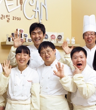 Workers at We Can pose at their cookie shop in Gyeonggi Province. (We Can)