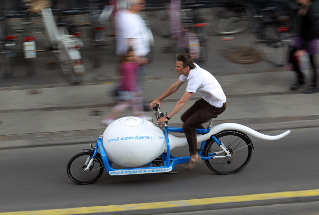 The spermbike “Spermbullit” is seen on a street of Copenhagen, Denmark. Some bicycles in Europe are designed to serve as billboards for companies, like the “sperm bike” used by a Danish sperm bank to transport sperm to fertility clinics in Copenhagen.   AP-Yonhap News