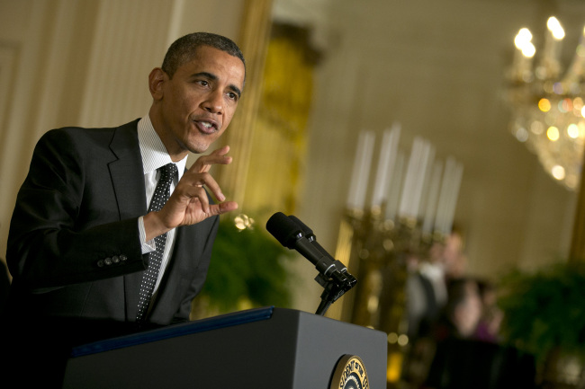 U.S. President Barack Obama speaks in the East Room of the White House in Washington, D.C., U.S., on Friday, Nov. 9, 2012. Obama is urging quick action by Congress to keep taxes from rising on middle-income Americans at the start of the new year and begin negotiations to avert automatic spending cuts. Photographer: Andrew Harrer/Bloomberg *** Local Caption *** Barack Obama
U.S. President Barack Obama speaks in the East Room of the White House in Washington, D.C., Friday.   Bloomberg
