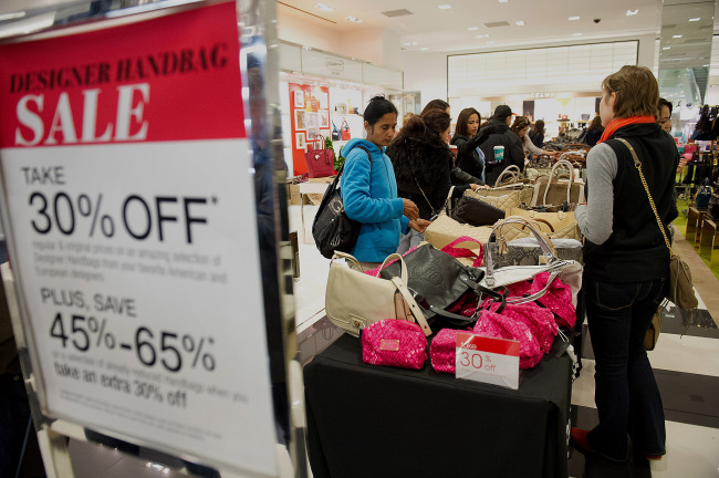 Shoppers browse handbags on sale at a Bloomingdale’s store in the Westfield San Francisco Center in San Francisco, California, Friday.   Bloomberg