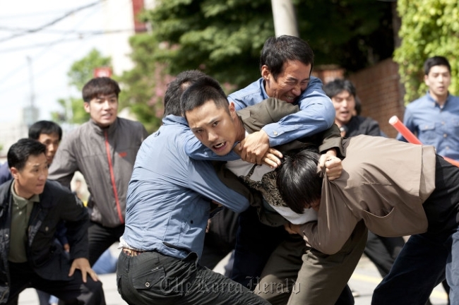 A scene from Cho Keun-hyeon’s ‘26 years.’   Cheongeoram Films