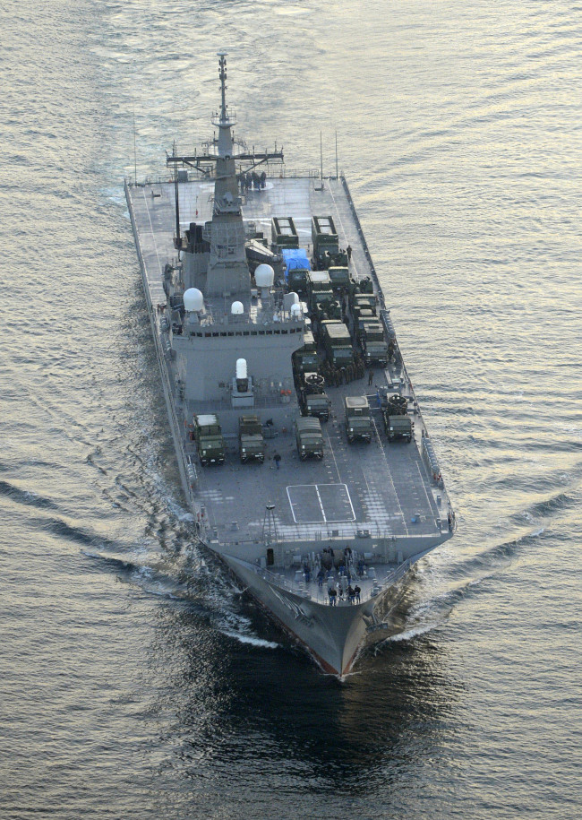 Japan’s Maritime Self-Defense Force transport ship Kunisaki, carrying ground-based Patriot Advanced Capability-3 interceptors, leave the MSDF base in Kure, Hiroshima Prefecture, western Japan. The Kunisaki and another MSDF transport ship, the Osumi, carry the missile interceptors to be deployed in Okinawa to prepare for North Korea’s planned rocket launch.   AP-Yonhap News