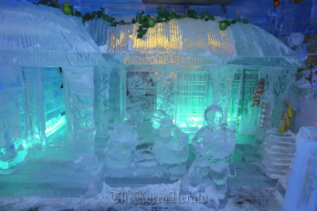 Ice sculpture of a traditional Korean hanok village.   Ice Gallery