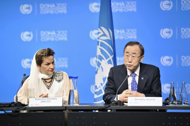 United Nations Secretary-General Ban Ki-moon (right) and Christiana Figueres, Executive Secretary of the United Nations Framework Convention on Climate Change, attend a joint press briefing at the Qatar National Convention Center in Doha on Friday.   Xinhua-Yonhap News