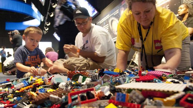 Children and their parents participate in a "Lego" competition at the Kennedy Space Center Visitor's Complex. (UPI)
