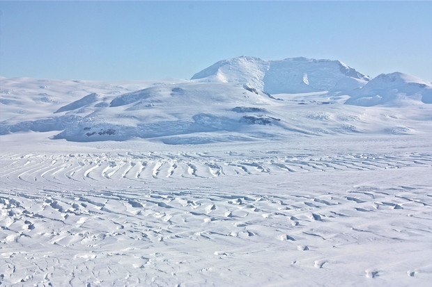 Mt. Murphy breaks out from the mostly flat, white landscape of West Antarctica. Lakes exist deep below the Antarctic surface because of ice pressure. (Bloomberg)