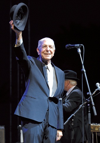 Leonard Cohen salutes the crowd during his performance on the first day of the Coachella Valley Music & Arts Festival in Indio, California. in April 2009. (MCT)