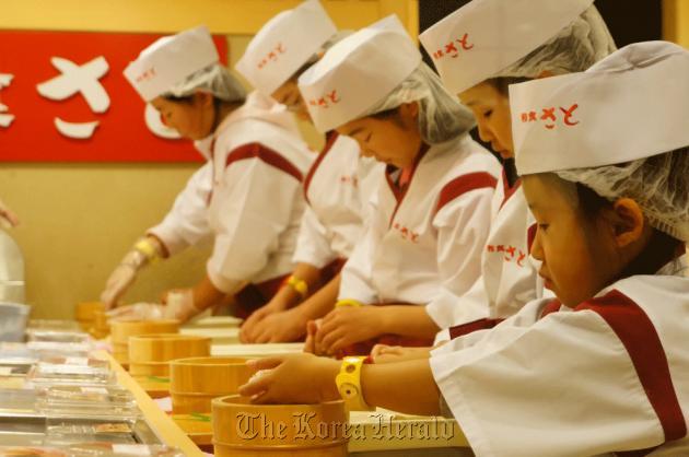 At KidZania, youngsters have fun trying out different careers while learning that money doesn’t grow on trees.   The Nation