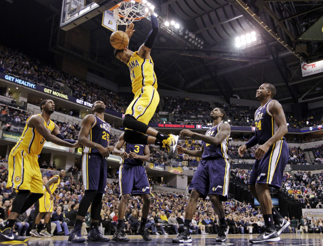 Indiana Pacers forward Paul George dunks against the Utah Jazz on Wednesday.   AP-Yonhap News
