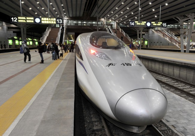 The G80 express train stops at the Beijing West Railway Station in Beijing on Saturday.   Xinhua-Yonhap News