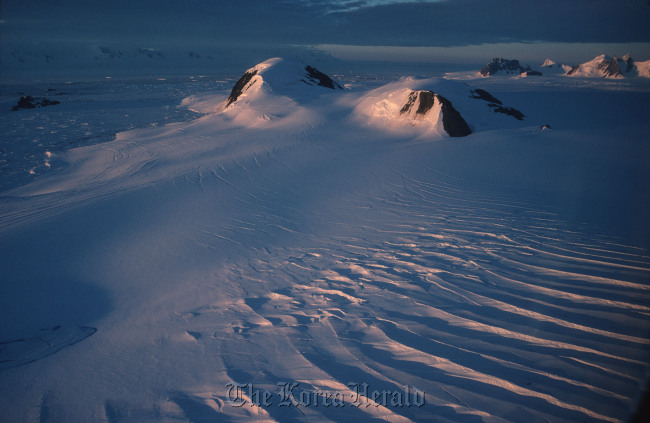 A glacier in Antarctica. The West Antarctic Ice Sheet is melting twice as fast as previously thought, a new study found.   Bloomberg