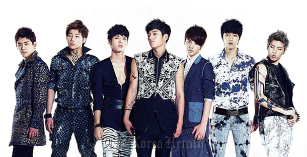 Dong-woo (far right) and Ho-ya (far left) of Infinite are set to debut this month as the hip-hop duo Infinite H.   Woolim Entertainment