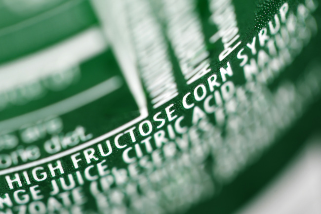 A soda can lists fructose as an ingredient. A recent study showed that fructose can trigger overeating.   AP-Yonhap News