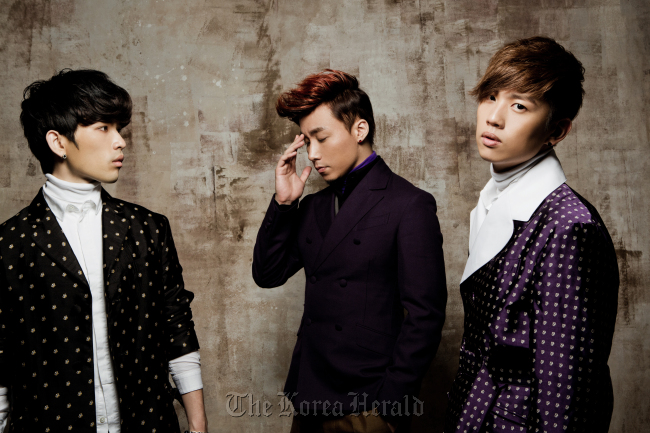 The members of the hip-hop trio Phantom (from left) Sanchez, Kiggen, and Han-hae.   WA Entertainment